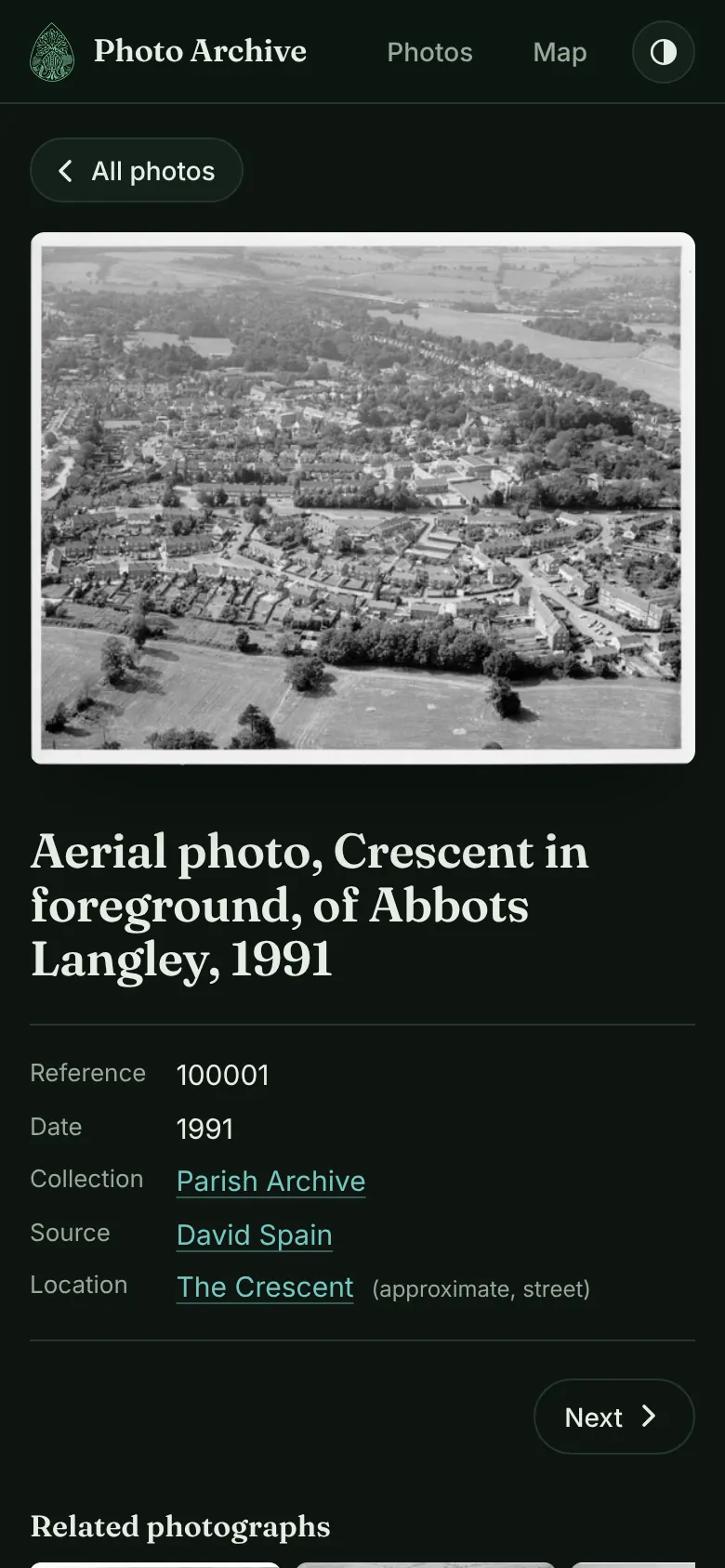 A rebuilt photo page on a phone in dark mode.